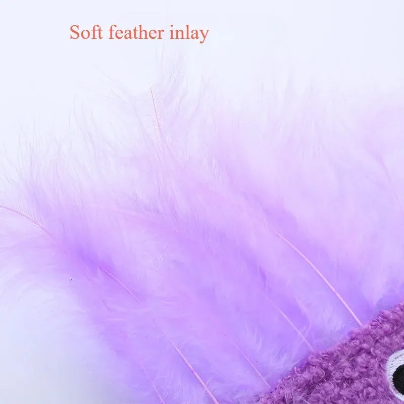 Colourful cat plush toy with a funny big mouth explosion head shape on a plain background.