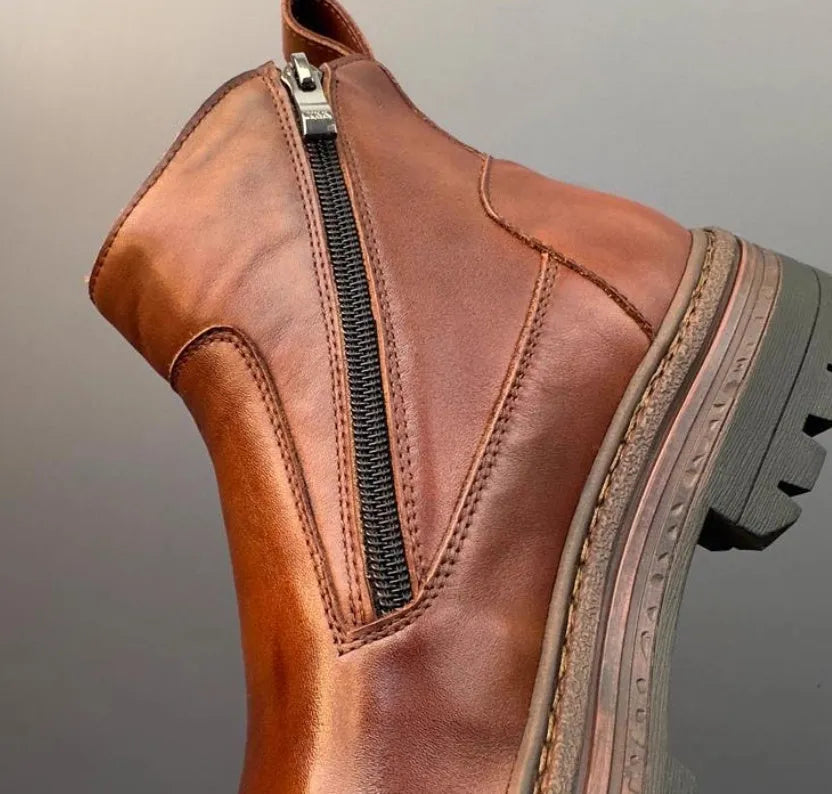 Men's Chelsea boots in black or brown with first layer cowhide vamp lining, zip closure and thick bottom heel, sizes 38-44