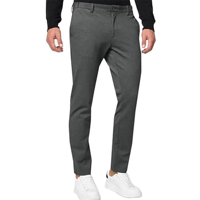 Men's slim-fit tapered chino trousers in a stretch cotton blend fabric, shown in a solid colour.