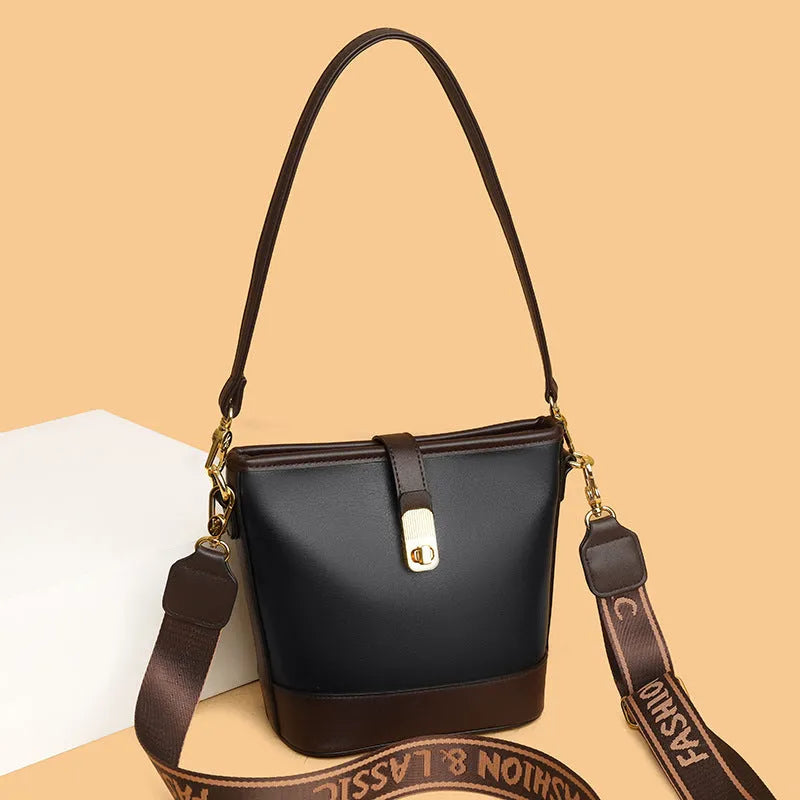 Soft black PU leather bucket bag with double shoulder straps and multiple compartments