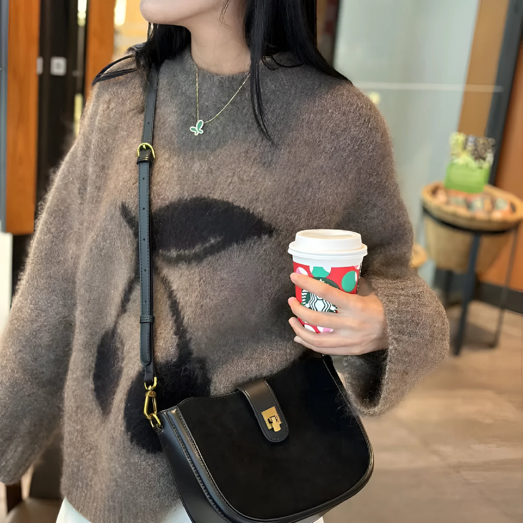 Genuine leather women's one-shoulder crossbody bag in black with sandwich pocket design
