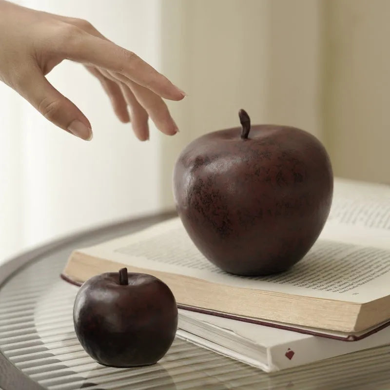 Retro Chinese ceramic simulation apple ornament on desktop, showing authentic details and ceramic construction