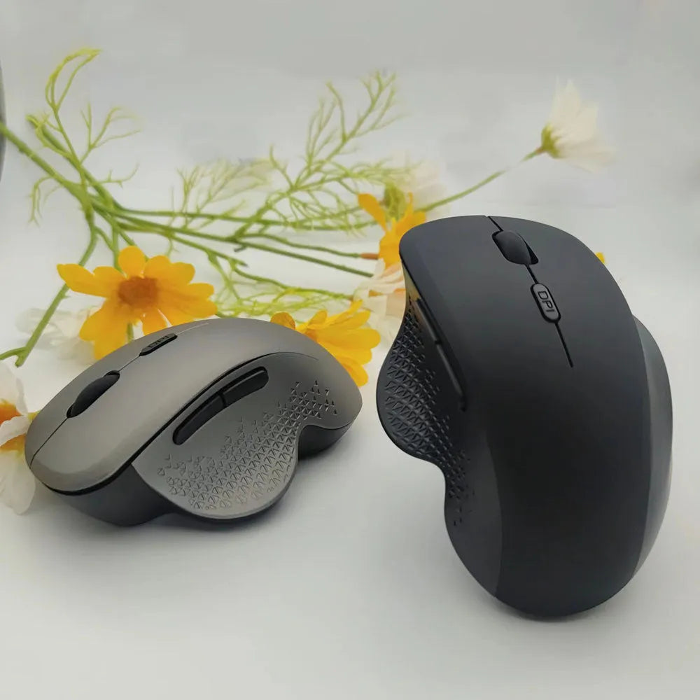 Grey self-charging wireless mouse for laptops with USB charging cable and photoelectric sensor