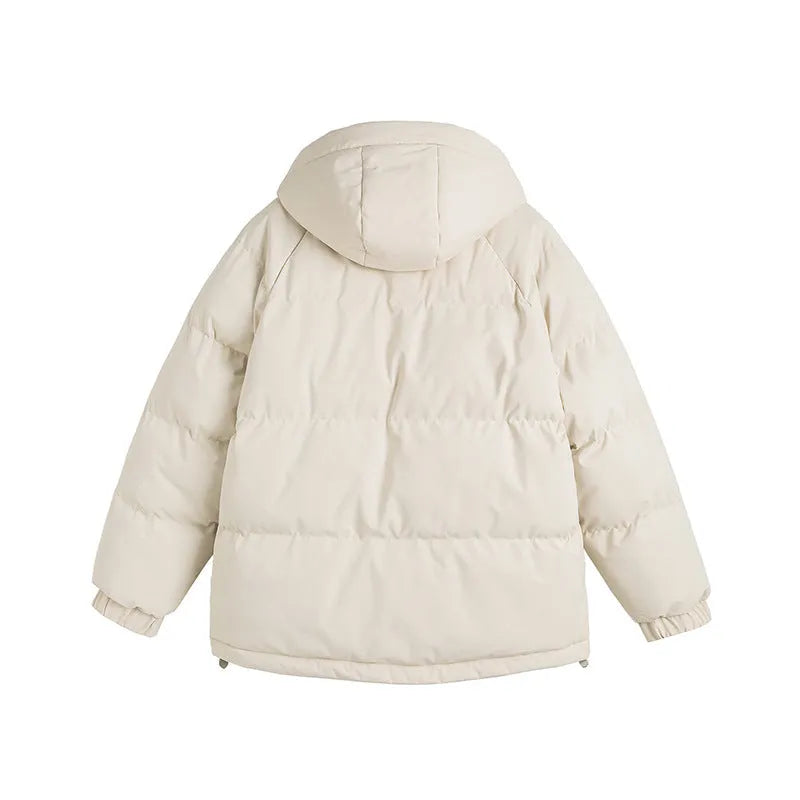 Winter two-piece cotton-padded coat in loose fit with side seam pockets, available in six colours like mustard yellow and light blue.