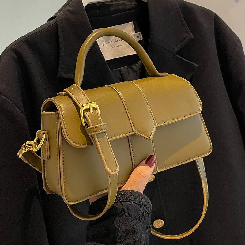 Women's beige messenger bag with 22cm width showing file compartment and exterior pocket