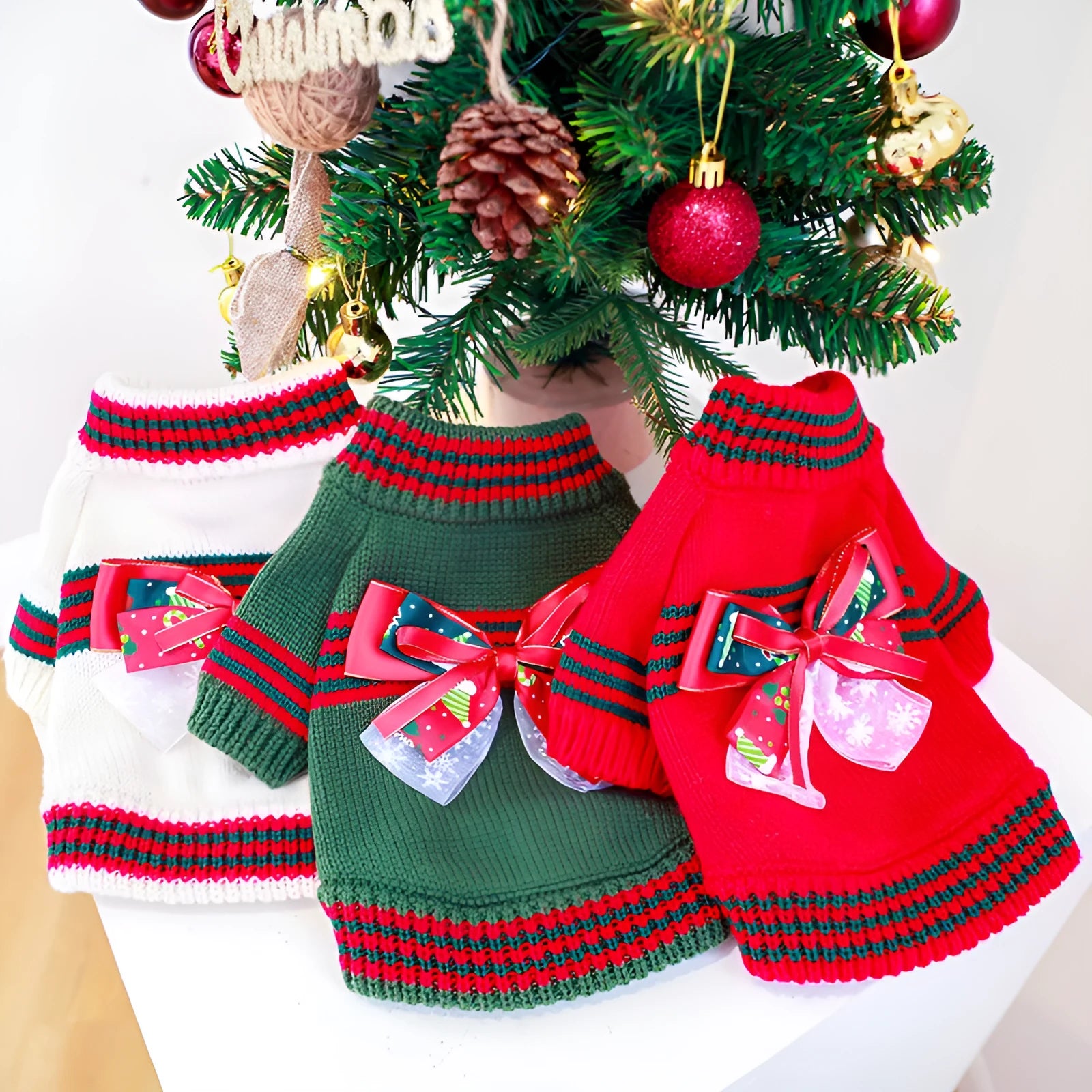 Red Christmas dog jumper on small dog showing polyester knit fabric and reinforced stitching