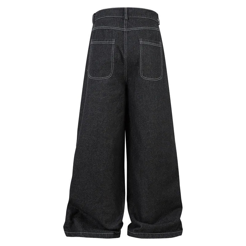 Black pleated multi-pocket workwear jeans with a mid waist and zip fly.
