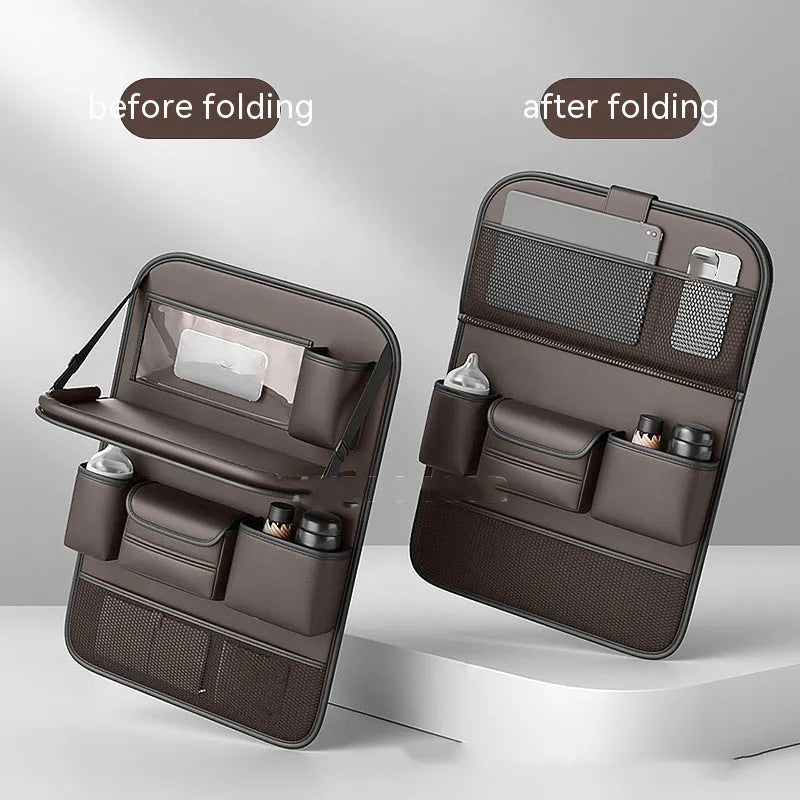 Black leather car seat storage bag with a foldable dining table deployed, hanging behind a car headrest