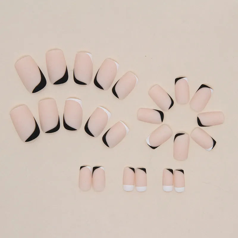 Black and white frosted manicure set with plastic wearable armour for DIY nail art