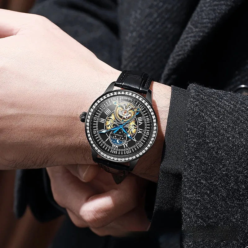 Men's mechanical watch with round dial, stainless steel strap, and transparent case back showing movement.