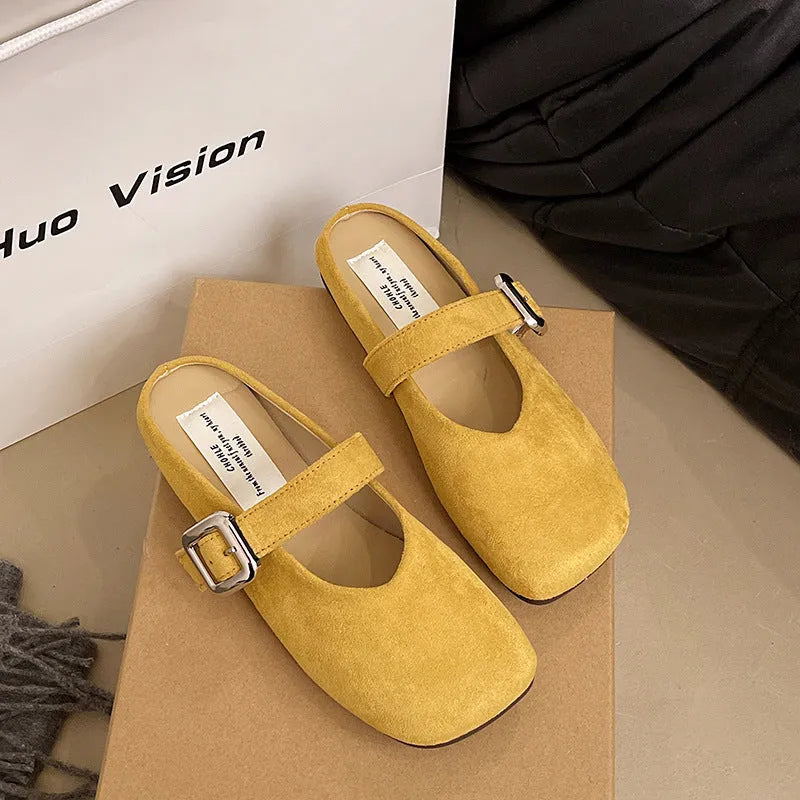 Women's flat closed-toe slippers in apricot colour with a square head design and rubber sole.