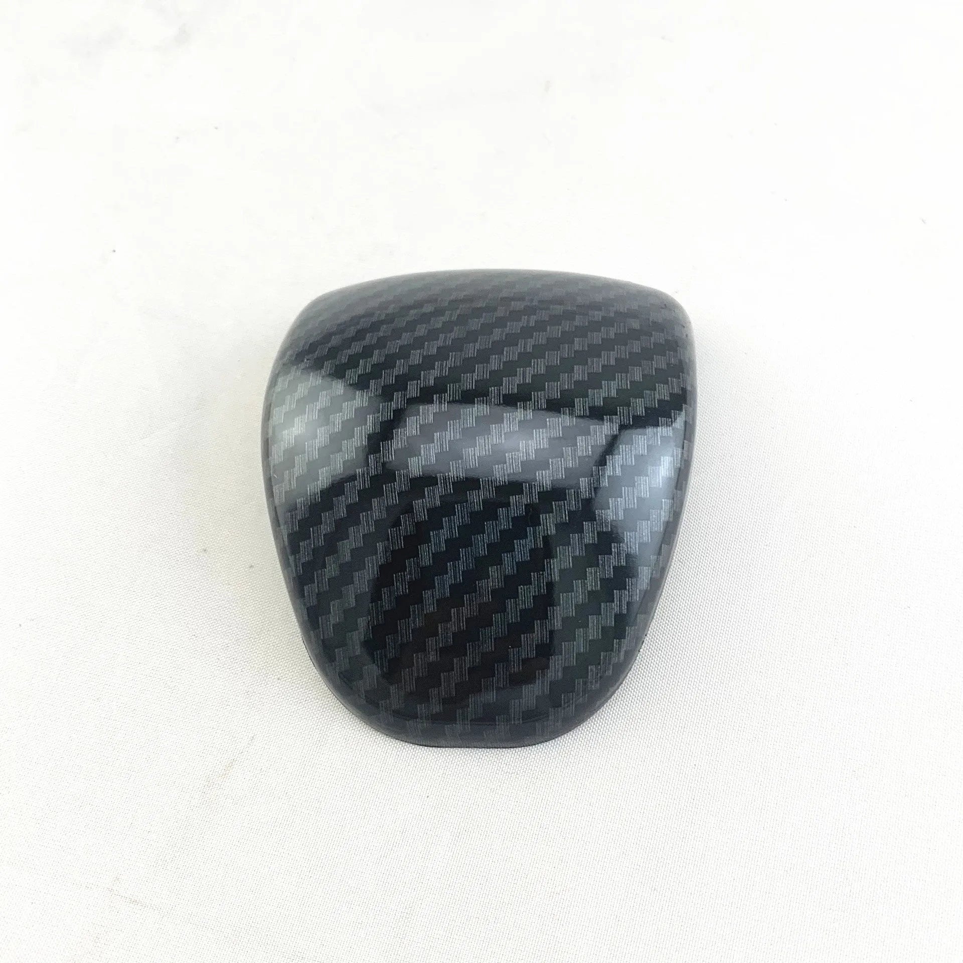 Carbon fibre pattern gear shift cover measuring 8cm diameter by 2cm height for automotive interiors