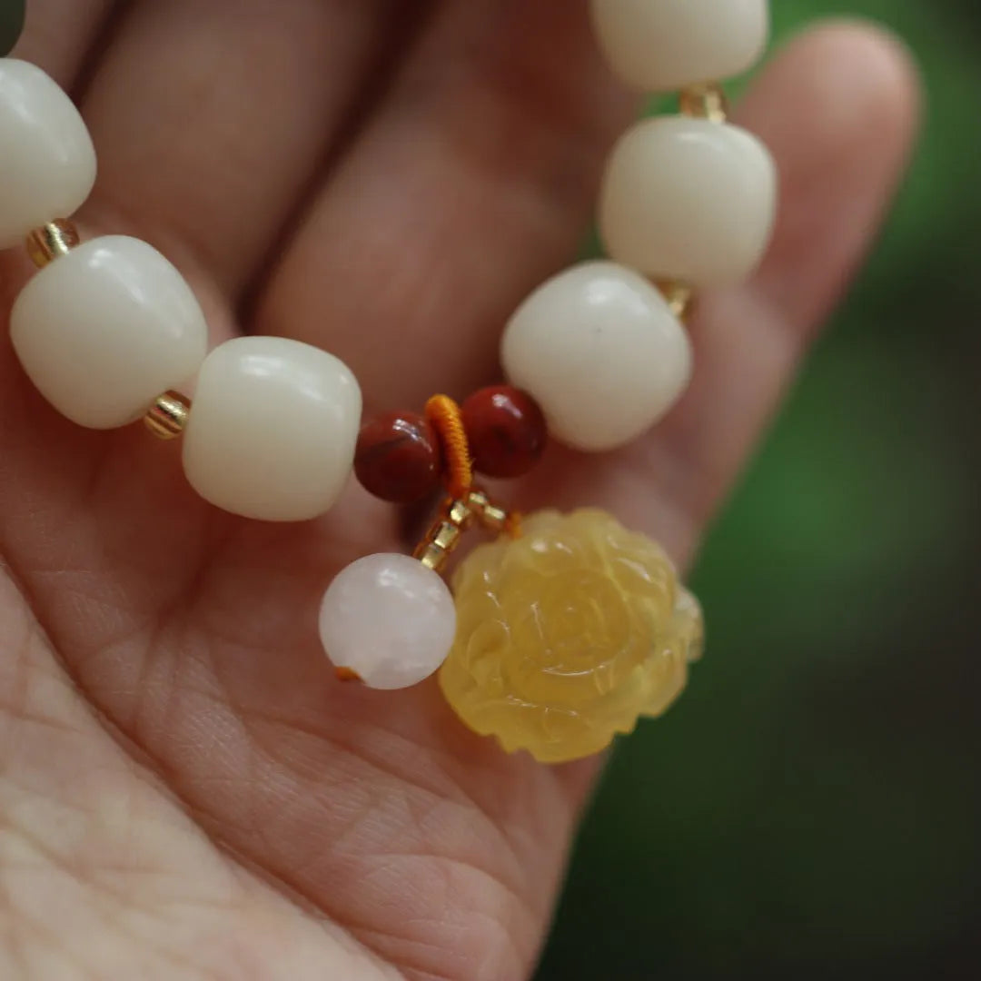 Gradient white jade bodhi bracelet with beeswax lotus pendant, 10mm flower beads