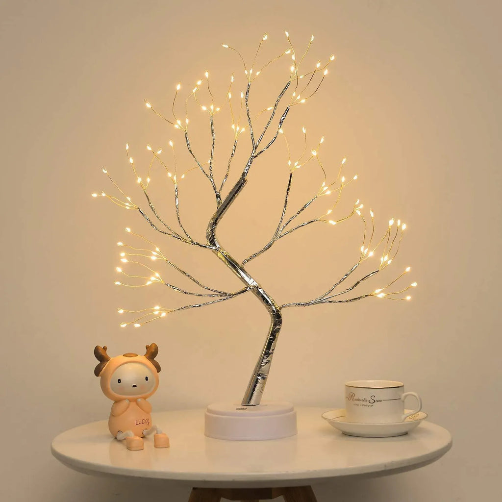 White LED tree-shaped lamp with bendable copper wire branches, 50cm tall, on a table.