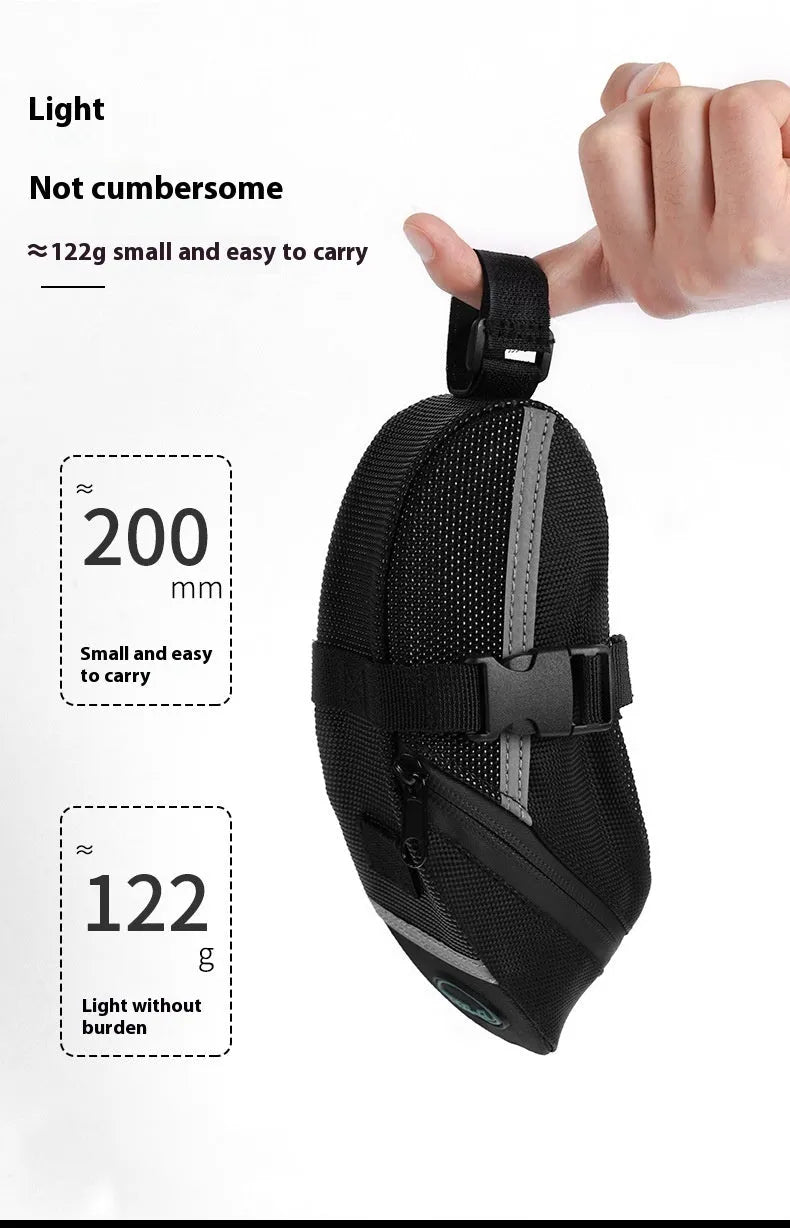 Black cycling quick release saddle bag with polyester construction mounted under bicycle saddle