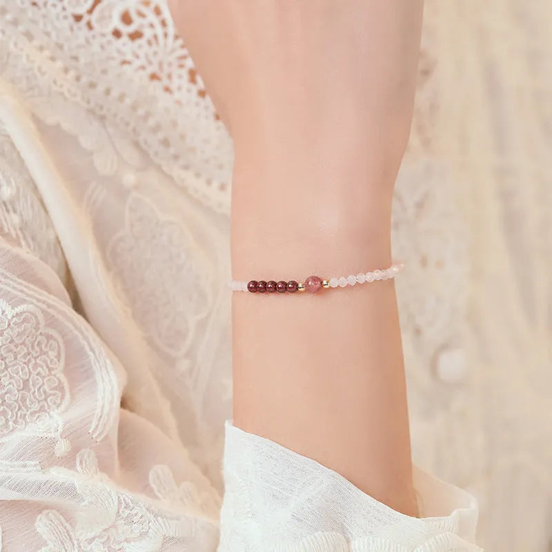 Handmade pink crystal and strawberry quartz bracelet with animal zodiac charm