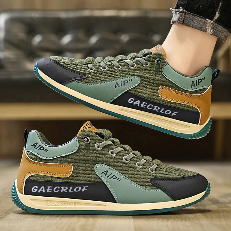 Men's grey and green mesh running shoes with low-top design and round toe