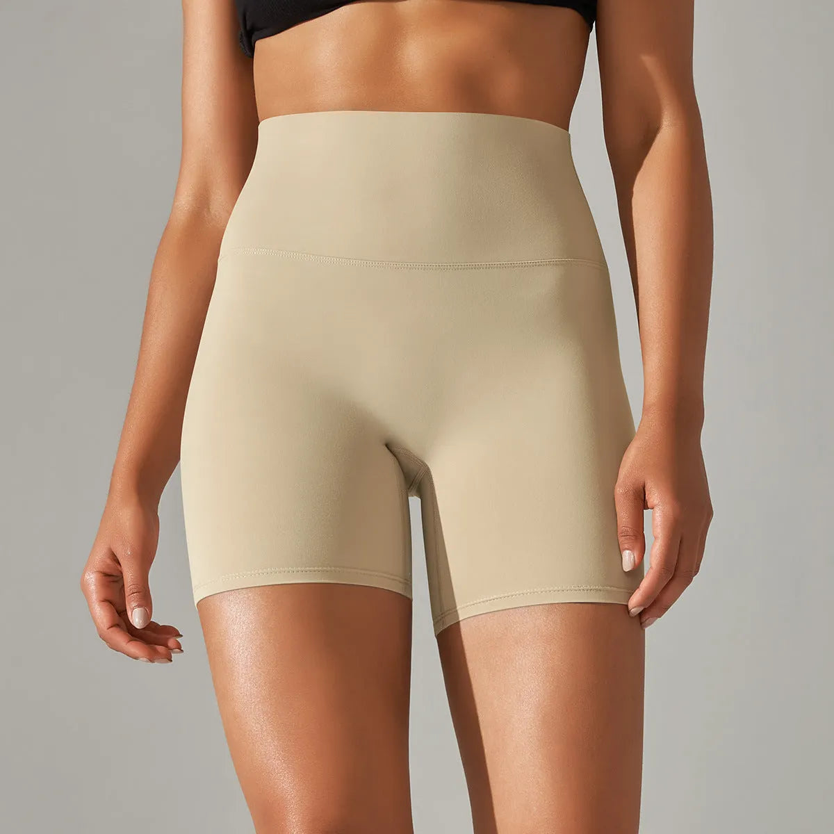 Women's high waist hip lift fitness tights in dark green, shown for sports and casual wear.