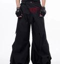 Boy modelling black wide-leg Korean-style summer trousers.