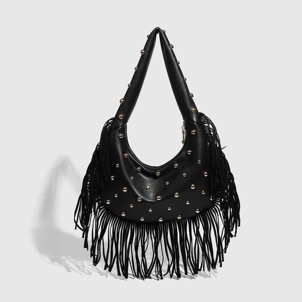 Retro tassel shoulder handbag in wine red with medium hardness construction and internal mobile phone compartment