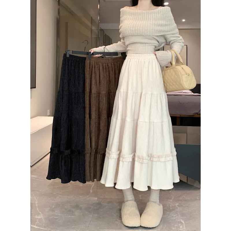 A-line corduroy midi skirt with elastic waistband in milky white colour showing 70cm length and ribbed fabric texture