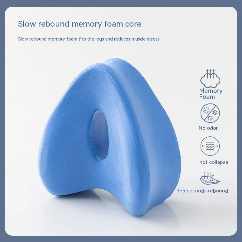 Heart-shaped memory foam leg pillow in dark blue jacquard, measuring 25x23x13cm, for adult leg support