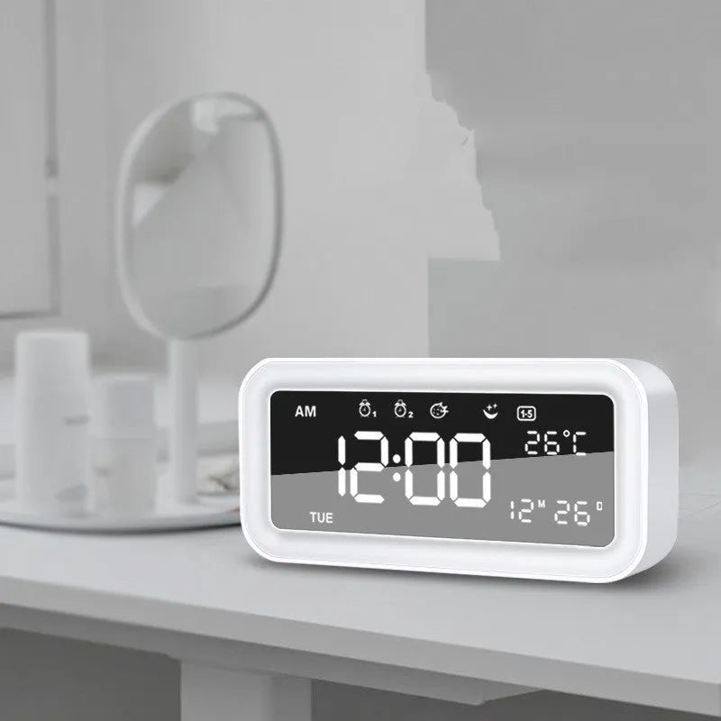 Rectangular LED atmosphere alarm clock in blue or pink with digital display and music function