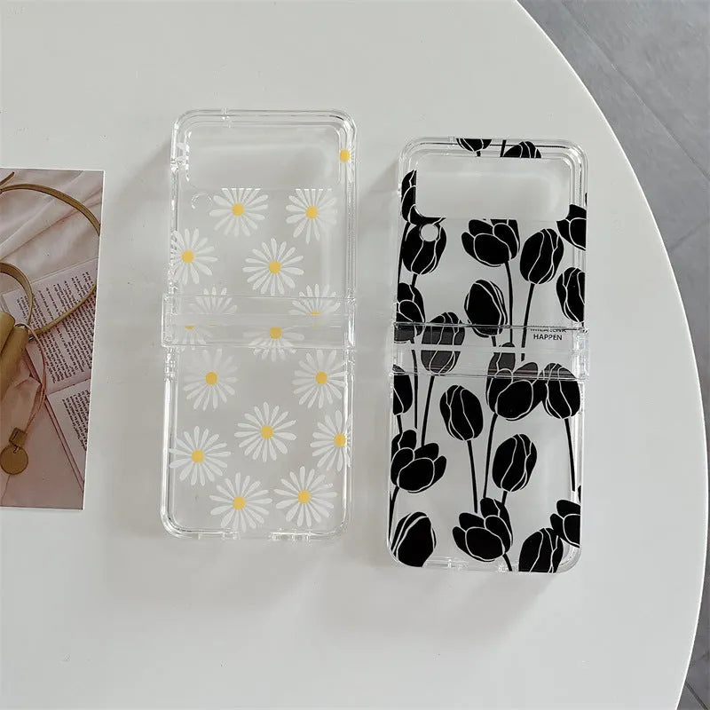 Clear Samsung Galaxy Z Flip phone case with floral pattern, available in Daisy and Tulip designs.