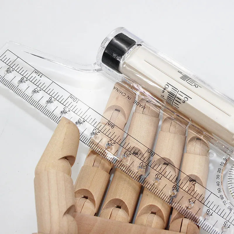 30 cm long plastic multifunctional rolling ruler for technical drafting on a drafting table.