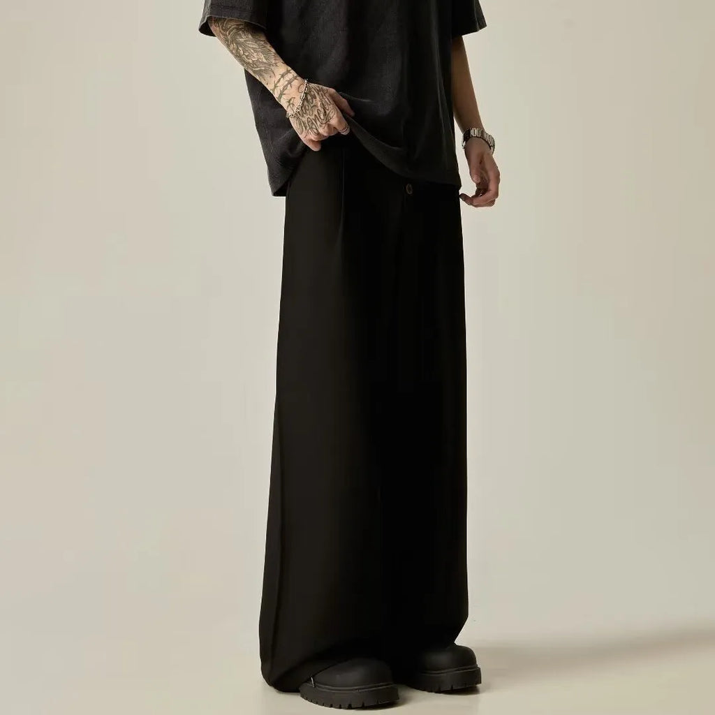 Men's black or brown wide-leg trousers with micro-elastic fabric and cardigan button opening