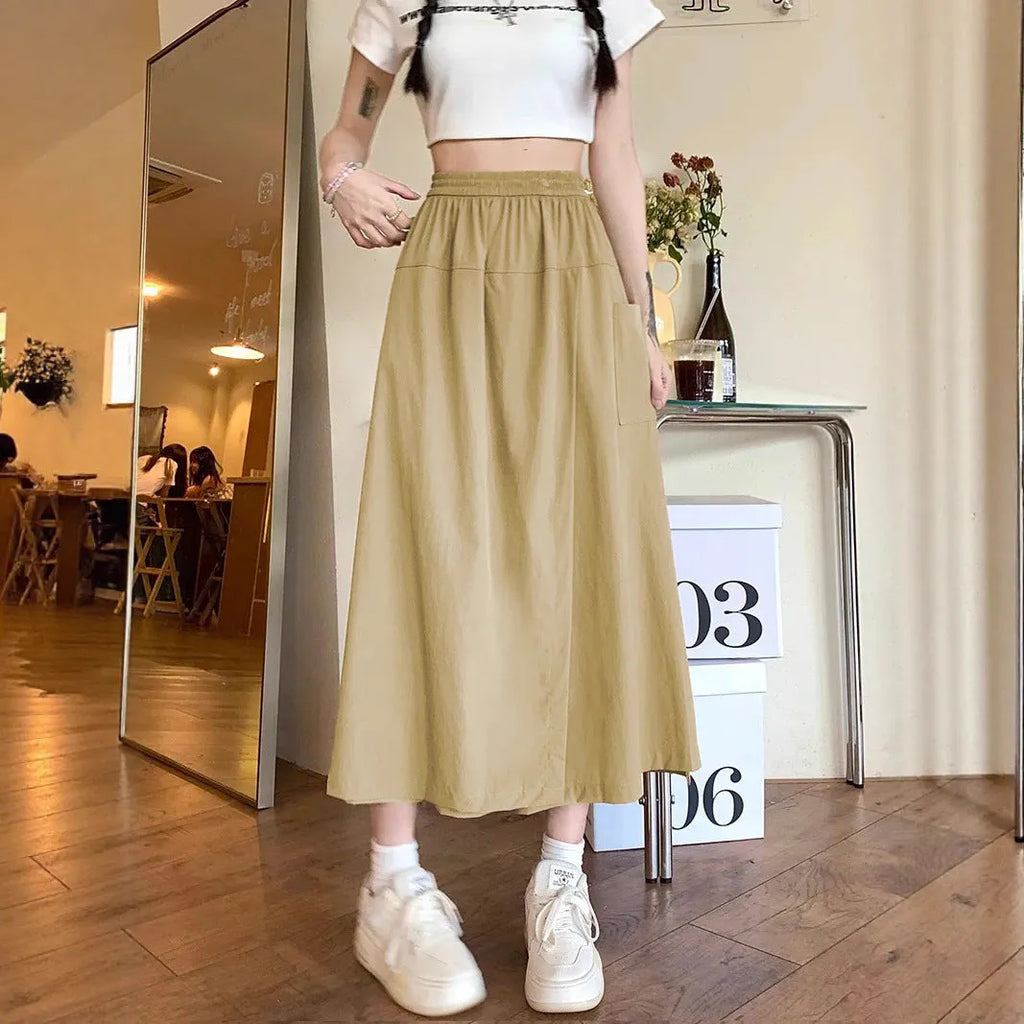 Camel coloured women's wide leg cropped casual skirt with an elastic waistband.