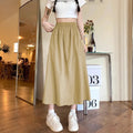 Camel coloured women's wide leg cropped casual skirt with an elastic waistband.