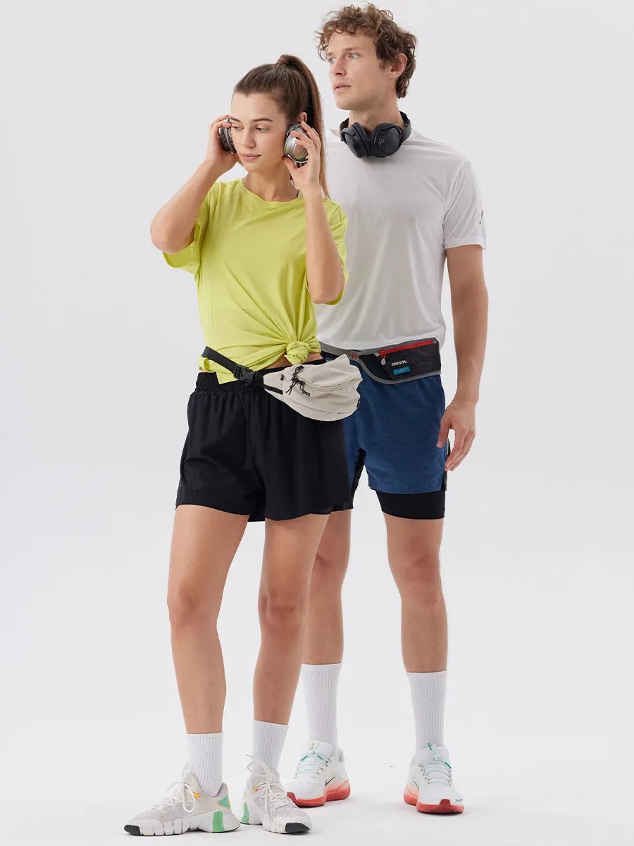 Men's straight-cut nylon sports shorts with side slits, shown in turmeric yellow, for summer athletic wear.