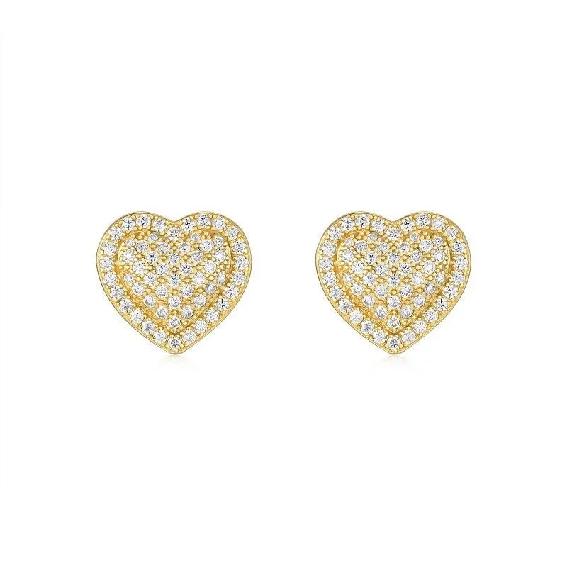 Golden heart-shaped moissanite stud earrings with sterling silver posts and butterfly backs