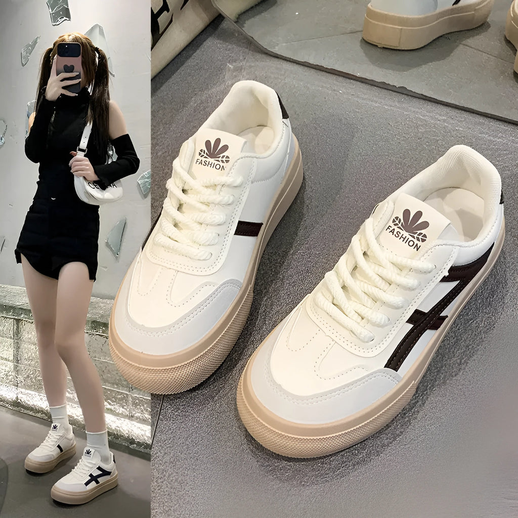 Brown and blue low-top casual board shoes with patent leather finish and round toe on a rubber sole.