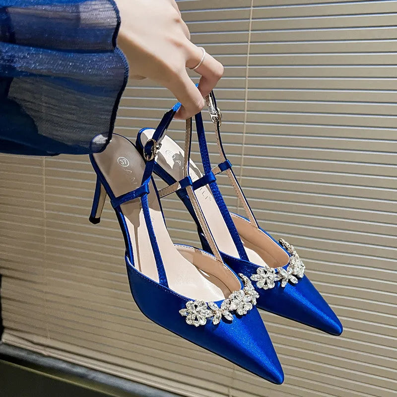 Women's satin stiletto high heels with rhinestone closed toe and buckle fastening in white, rose red, or blue