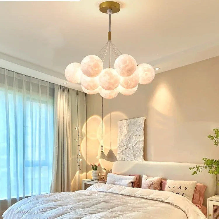 Nordic-style gold chandelier with multiple bubble-shaped lampshades and LED lights
