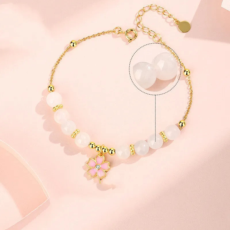 Women's pink bracelet with S925 silver cherry blossom pendant and Hetian jade beads in sweet floral style