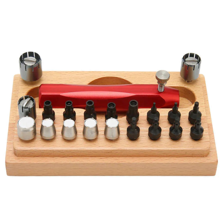 20-piece steel watch repair barrel-opening tool set on a workbench