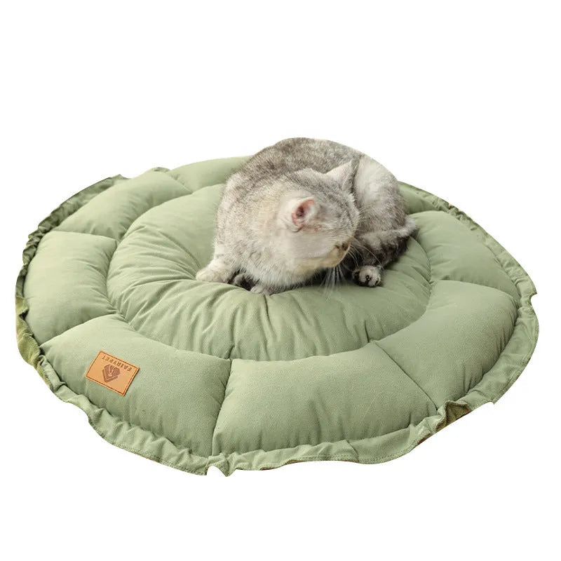 Reversible donut cat bed in grey or green colour, showing dual-use design and size options for indoor cats