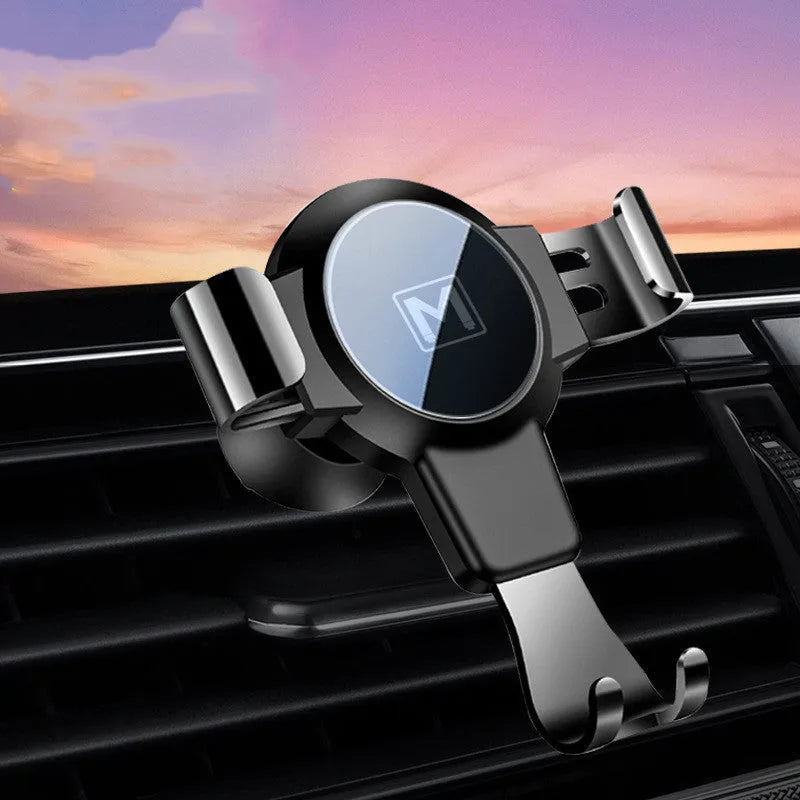 S4 gravity mirror ABS mobile phone bracket attached to car air conditioning vent, holding a smartphone