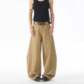 Men's brown straight-leg jeans with micro-elasticity, button-fly opening, and mid-waist design