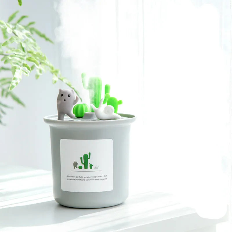 Vase-shaped pet humidifier in grey, pink, or white with mechanical dials and a water tank.