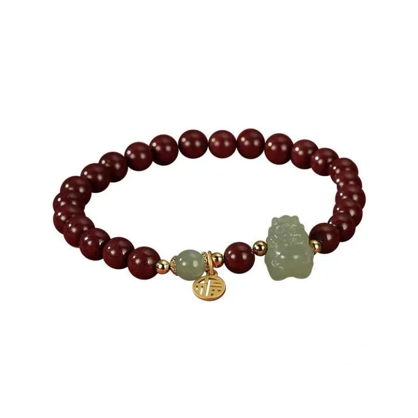 Hetian Jade Cinnabar Bracelet with 8mm beads showing Emperor Sandstone style and Zodiac animal modelling