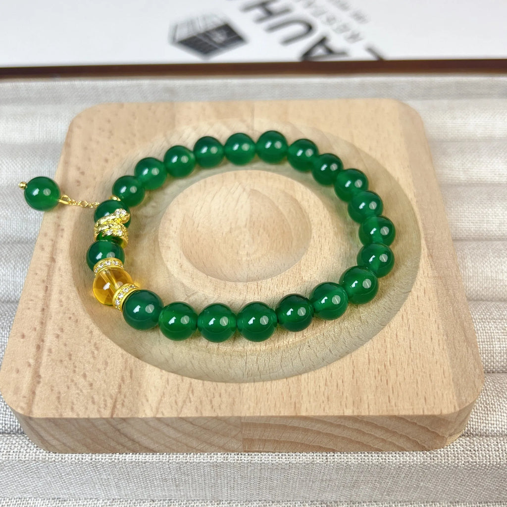 Green chalcedony and red agate roll wealth snake bracelet with copper fittings on wrist