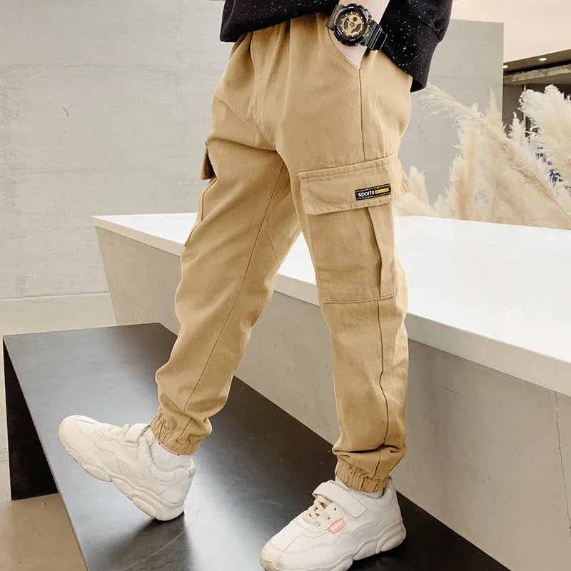 Boys' casual cotton summer trousers in khaki, available in sizes from 110cm to 170cm.