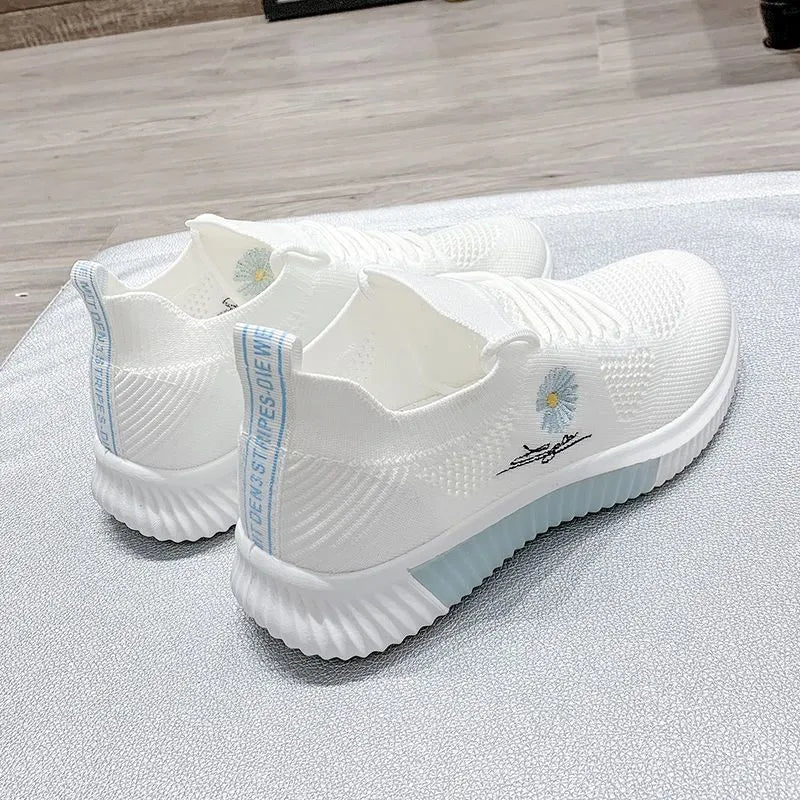 Breathable flyknit low top trainers with mesh upper, cotton lining, PVC sole and front lace-up in pink, blue or black