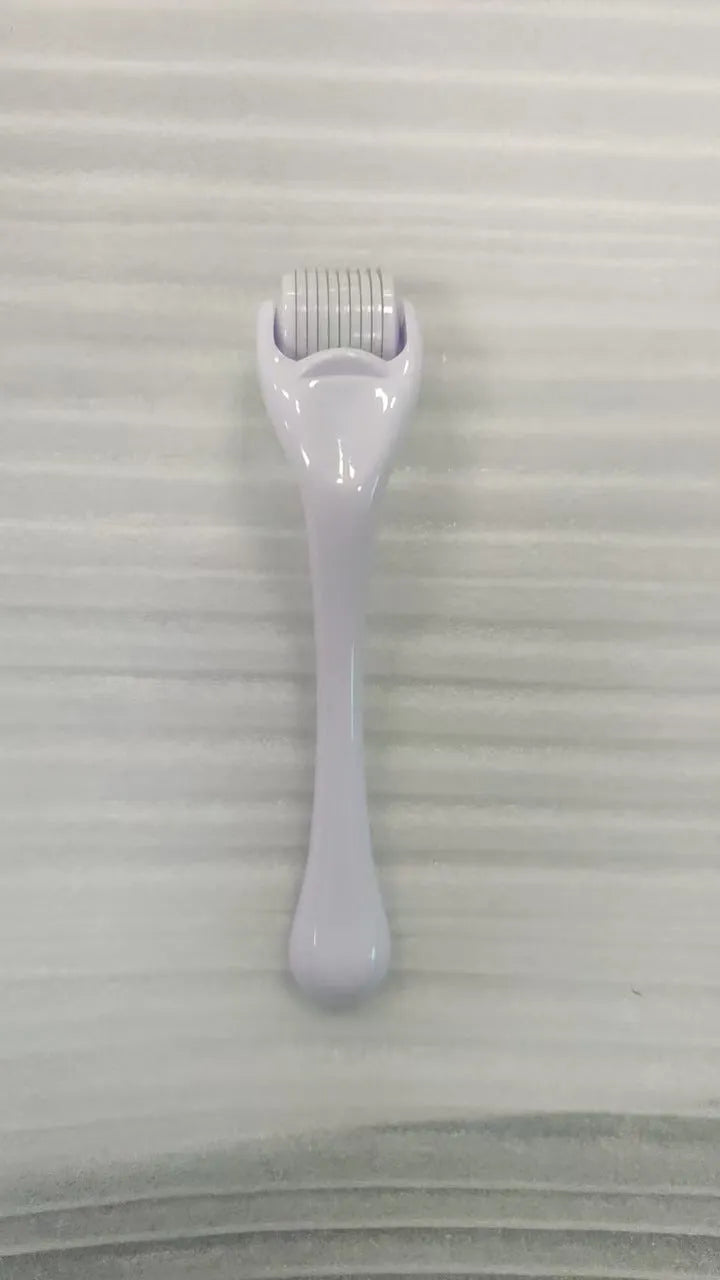 540 micro needle roller with PC handle and coloured wheel showing needle configuration for skin treatment