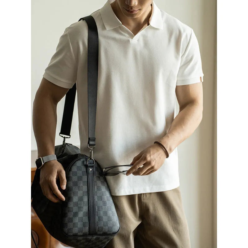 Men's blue short sleeve cotton polo shirt on a hanger, regular fit.