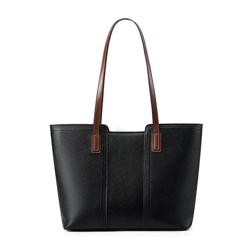 Women's black genuine cowhide leather commuter bag showing internal zipper change bag, mobile phone pocket, file compartment, and crossbody strap
